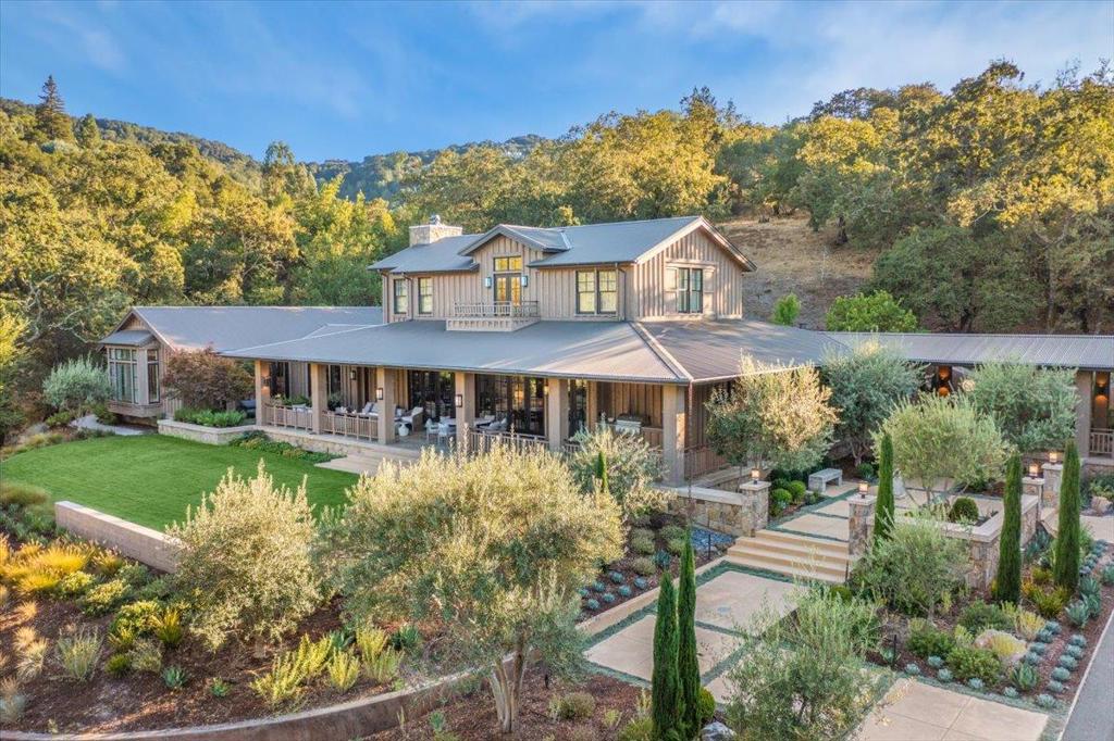 A contemporary architectural masterpiece of epic proportions set in one of the most prestigious neighborhoods in Downtown Los Gatos*The precision of the construction, the material used, and the level of finishes are unparalleled in this 5+acre private estate*This contemporary farm house estate was built in 2019, & had a $2M remodel in 2023 by top interior designers & landscape architects*This 4,932 SQFT estate offers 5 exquisite suites including a formal office/library & three & one half exquisite interior designed bathrooms*Recent remodel includes new landscaping, wet bar, smart home technology, custom chandeliers, plumbing fixtures, new Divinci modern fireplace, & new outdoor fire pit*2 car garage, plenty of room for infinity edged designer pool, spa, and pickle ball/sports court*Oversized dining area, great room, remodeled kitchen, formal library, & massive primary suite all on the ground level*Open beam & cathedral ceilings, cedar board & batten siding, tumbled limestone & wide plank hardwood flooring, corrugated metal roofing, & all new interior & exterior lighting creating a comforting ambience w/ sophisticated overtones*Unparalleled privacy & proximity to Los Gatos distinguished schools, restaurants & shopping*Warm & elegant contemporary living in a very intimate setting!