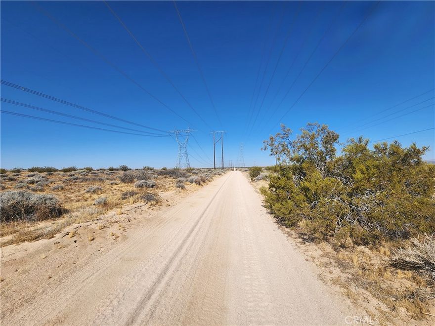 25 Acres (APN's 0490-183-39 and 0490-183-40), GPS: 34.996184, -117.348531 TWO Parcels, offered together, totaling 25 acres in Hinkley, CA in San Bernardino County. The property, zoned for Rural Living (RL), offers an exceptional opportunity for solar development. While primarily designated for residential use, the zoning also permits accessory crop production and agricultural structures. Notably, commercial renewable energy facilities are allowed under the San Bernardino Development Code, making this an ideal site for solar projects. Strategically located, the property is approximately 0.7 miles east of a 33-kilovolt overhead power line, 80 feet north of a 220-kilovolt overhead power line, and 100 feet north of a 500-kilovolt overhead power line, providing excellent connectivity for power generation. Additionally, flood maps show that the property is not within the 100, 200, or 500-year flood plains. Nestled in the heart of the Mojave Desert, the Kramer Junction and Hinkley area combine natural beauty with historical significance. The expansive, rugged terrain and stunning desert landscapes make this region attractive for sustainable energy development. The Mojave Solar Project (Abengoa), a 250 megawatt solar electric facility is operating in the area. This property does not yet have an address. While the boundary lines on the map offer a glimpse, they are only approximate. A Buyer should verify boundaries, zoning and utilities, ensuring every aspect aligns with their vision for the property.