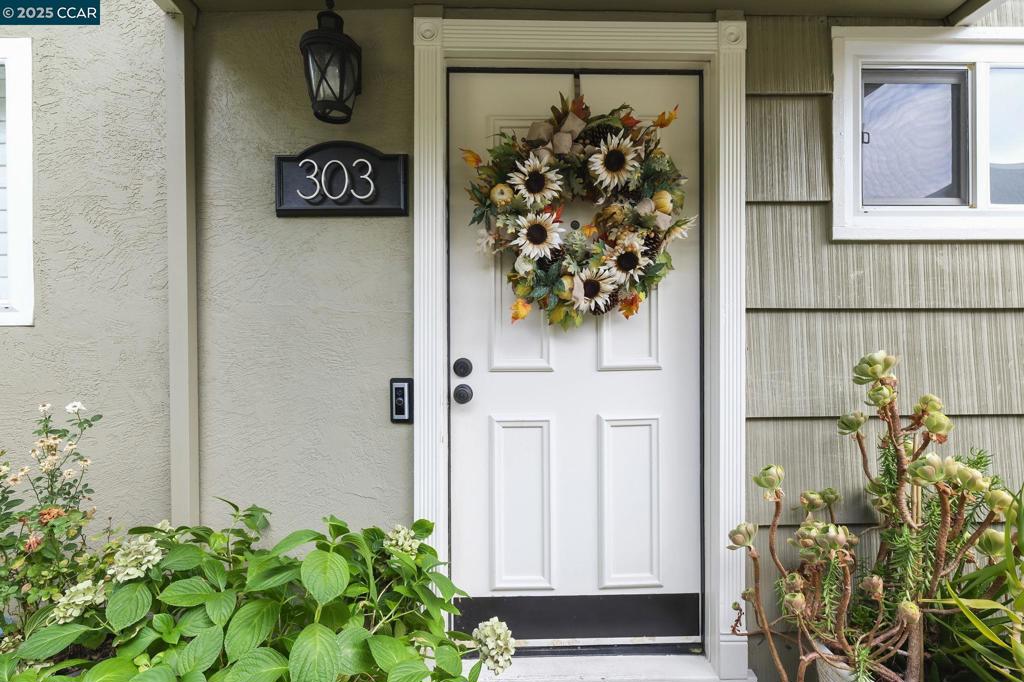 Easy living in the heart of West Danville. Beautifully updated 2-story townhouse that has been thoughtfully upgraded for both style & comfort. It has an open floor plan with recessed lighting throughout, attractive marble & vinyl flooring, a modern kitchen with marble counters, as well as a gas-powered fireplace & French doors that open to an inviting enclosed private patio. The dual-pane vinyl windows with energy efficient shutters & a newer (March, 2023) furnace/air conditioning system ensure year-round comfort. Convenience is built right in, with a dedicated covered parking space located close to the home & a large private storage closet on the patio. Enjoy community amenities including a pool, spa, & clubhouse, wonderful for relaxing or entertaining. The location is ideal—just minutes from downtown Danville & top-rated schools, with quick commuter access to major routes. The HOA covers hot & cold water, garbage service, exterior and common area maintenance & professional management, allowing you to enjoy a low-maintenance lifestyle. This move-in ready home is a rare opportunity to enjoy both comfort & convenience in one of Danville’s most desirable neighborhood!
