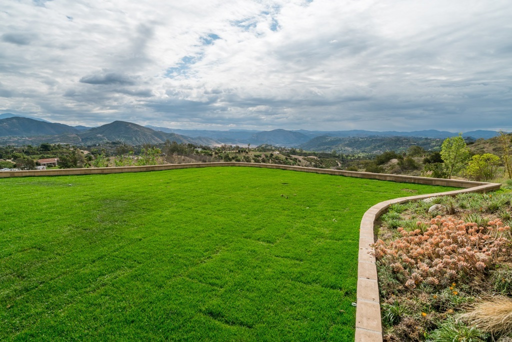 Beautiful One Story Custom Estate with Endless Panoramic Views! Perfectly Located near the 15 & Temecula's Wine Country, this Residence Features its Own Private Gated Entrance; Expansive Living Areas, Designed Within an Open Floor Plan; Hardwood Flooring; Granite Countertops with Accent Touches Throughout; Gourmet Kitchen Offering a Wraparound Raised Breakfast Bar, Butler Area, Walk-in Pantry, & Breakfast Nook; Recessed Lighting; Built-In Office; Huge Game Room; Large Laundry Room; 2 acres; One of a Kind! Neighborhoods: Yucca Equipment: Range/Oven Other Fees: 0 Sewer: Septic Installed Topography: LL,