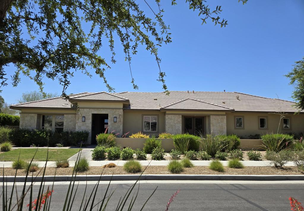 You'll find designer-chosen features at every turn in this exquisite Caminata (former) model home! This stunning kitchen features upgraded kitchen appliances and quartz countertops with a large island where guests will love to gather. You will also love the two multi-panel sliding glass doors that open the dining area and great room to a spacious covered patio that seamlessly connect you indoor living areas to your patio and custom landscaped yard featuring 2 firepits and 2 fountains!Additional spaces in this home include a smart space laundry room, and gorgeous primary bath with framed vanity mirror and center loaded shower, a handsome den for your home office or library with built-in book shelves, and cozy guest en suite for your visting family and friends. On-Site Sales Center open daily for tours of this home and the amazing Trilogy Polo Clubhouse! The clubhouse restaurant, June Hill's Table is open to the public - No membership required. The other Clubhouse facilities and amenities are private and require an additional membership, initiation fee, and monthly dues for use. Home comes with a financed photovoltaic (PV) solar system. Trilogy(r) at The Polo Club are intended for occupancy by at least one person 55 years or older, with certain exceptions. All information is presumed accurate but not guaranteed. Inquire with Shea Homes for details.