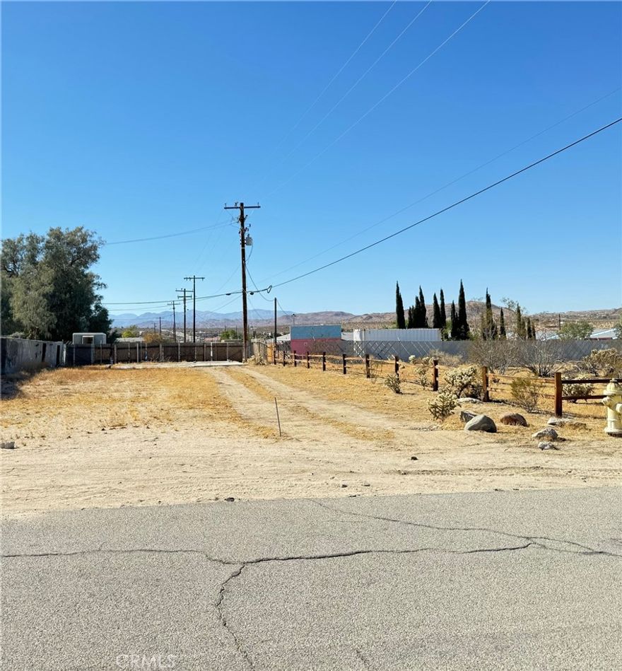 THIS LAND PRESENTS A PRIME OPPORTUNITY FOR INNOVATIVE RESIDENTIAL DEVELOPMENT. BOASTING A PREMIUM LOCATION NEAR JOSHUE TREE NATIONAL PARK AND CONVENIENT HIGHWAY ACCESS.