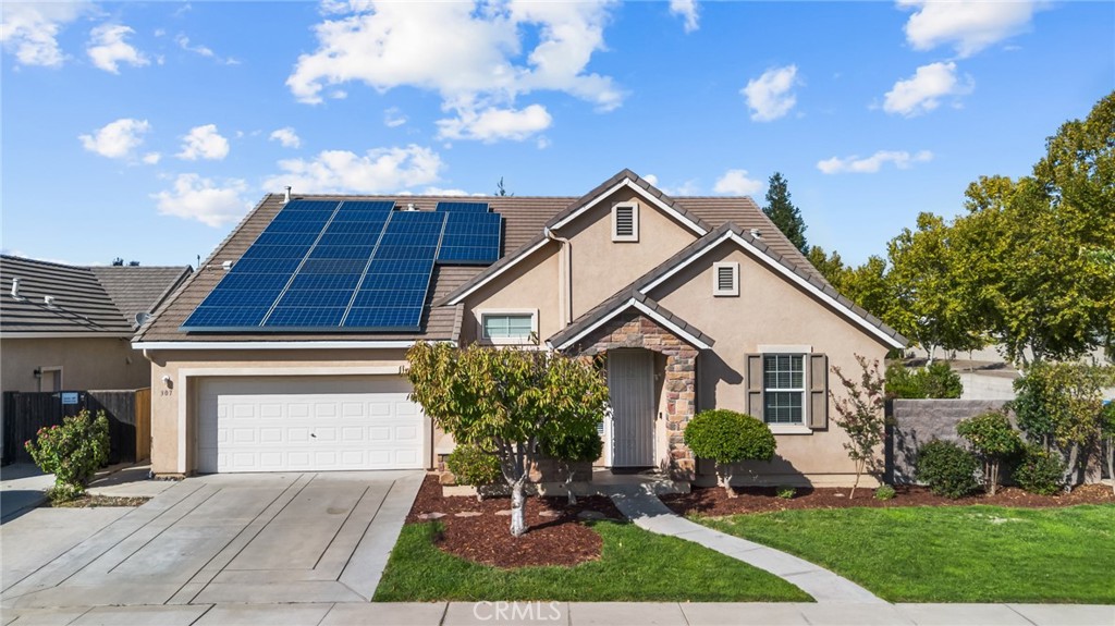 Step into this beautifully updated 4-bedroom, 2-bath home in one of Merced’s most desirable neighborhoods — Bellevue Ranch. With 2,455 sq. ft. of living space on a nearly 10,000 sq. ft. lot, this home was designed with both comfort and functionality in mind.
From the moment you walk in, the spacious formal living and dining rooms set the tone for gatherings with family and friends. At the heart of the home, the chef’s dream kitchen offers endless counter space, abundant cabinetry, and a seamless connection to the family room — perfect for entertaining or cozy evenings in.
The primary suite is a true retreat, featuring a walk-in closet and a hidden bonus room ideal for a home office, craft space, gym, nursery, or reading nook. The ensuite bathroom invites relaxation with a jetted tub, separate shower, dual sinks, and plenty of counter space.
Throughout the home you’ll find all new light fixtures, ceiling fans, and fresh interior paint, giving every room a bright and welcoming feel. A separate laundry room with utility sink adds everyday convenience.
Step outside to your expansive backyard — freshly landscaped and ready for barbecues, playtime, or creating the outdoor oasis of your dreams. With a 9,772 sq. ft. lot, the possibilities are endless.
And with 31 solar panels, you’ll enjoy energy efficiency that keeps your home as smart as it is beautiful.
This move-in ready Bellevue Ranch home offers the perfect blend of space, style, and sustainability — all in a neighborhood you’ll love to call your own.