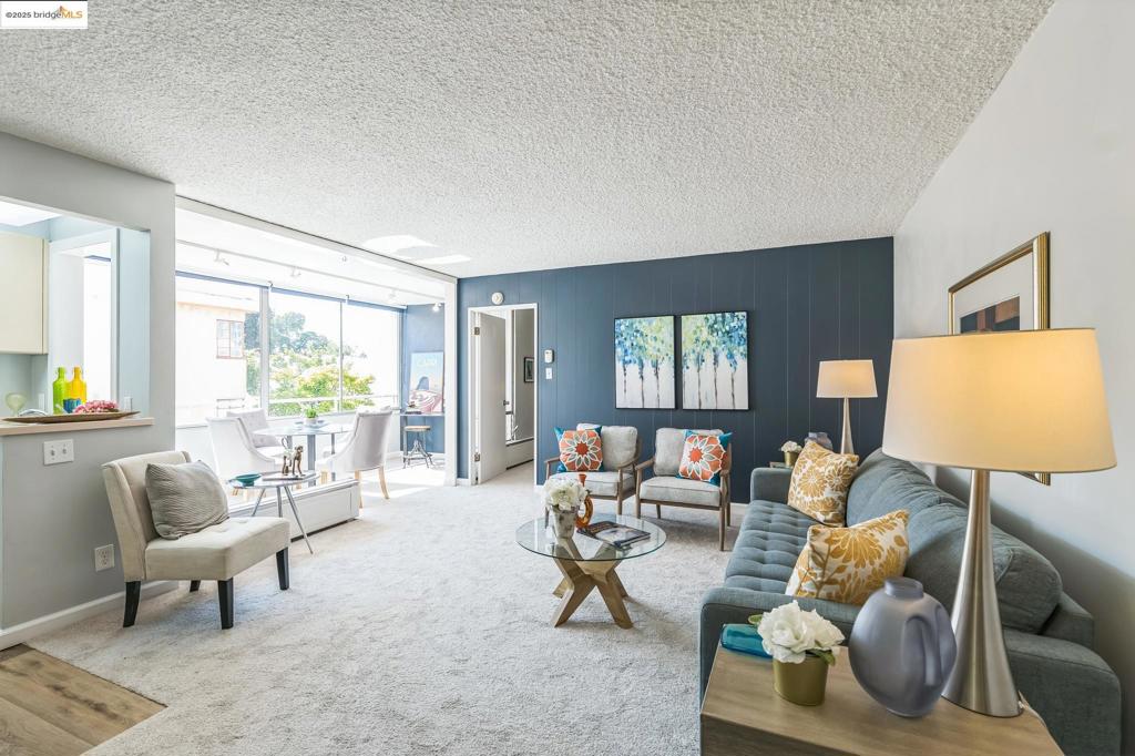 Lovely, well-maintained 55+ community with an active lifestyle and wonderful amenities! This beautifully remodeled end-unit features fresh paint throughout, new carpet, custom blinds, and abundant natural light. The bright, open layout offers great privacy, with windows facing the peaceful patio—away from any street noise. Ample storage, including a convenient entry closet. Berkeley Town House invites you to join a vibrant community with movie nights, book clubs, Spanish classes, Scrabble, political discussions, exercise facilities, ping pong, walking groups, and more. Ideally located near public transportation, shopping, dining, and entertainment.