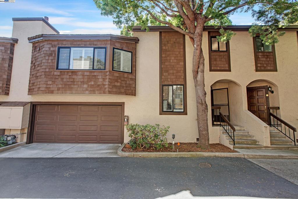 Beautifully updated and move-in ready, this light-filled 2-bedroom, 2-bathroom townhome-style condo is ideally located in the heart of Santa Clara yet tucked away in a private 12-unit complex. The spacious open floor plan features vaulted ceilings, hardwood floors throughout, and upgraded plantation shutters on every window for a refined designer touch. The thoughtfully remodeled kitchen offers white cabinetry, granite countertops, stainless steel appliances, and a cozy dine-in area with sliding doors that open to a private fenced backyard with deck, perfect for outdoor dining or relaxing. Both bathrooms have been tastefully updated with granite countertops, and the two generous bedrooms are positioned on opposite sides of the home for ultimate privacy. The inviting living room offers a warm fireplace and wet bar, creating the perfect space for entertaining or quiet evenings at home. Additional features include in-garage laundry, central heating and air conditioning, an attached two-car garage, and guest parking. Residents also enjoy access to a charming courtyard area. This home’s prime location offers easy access to Santa Clara University, Levi’s Stadium, Santana Row, Valley Fair, and major employers such as Apple, NVIDIA, and LinkedIn,this property blends comfort, style,