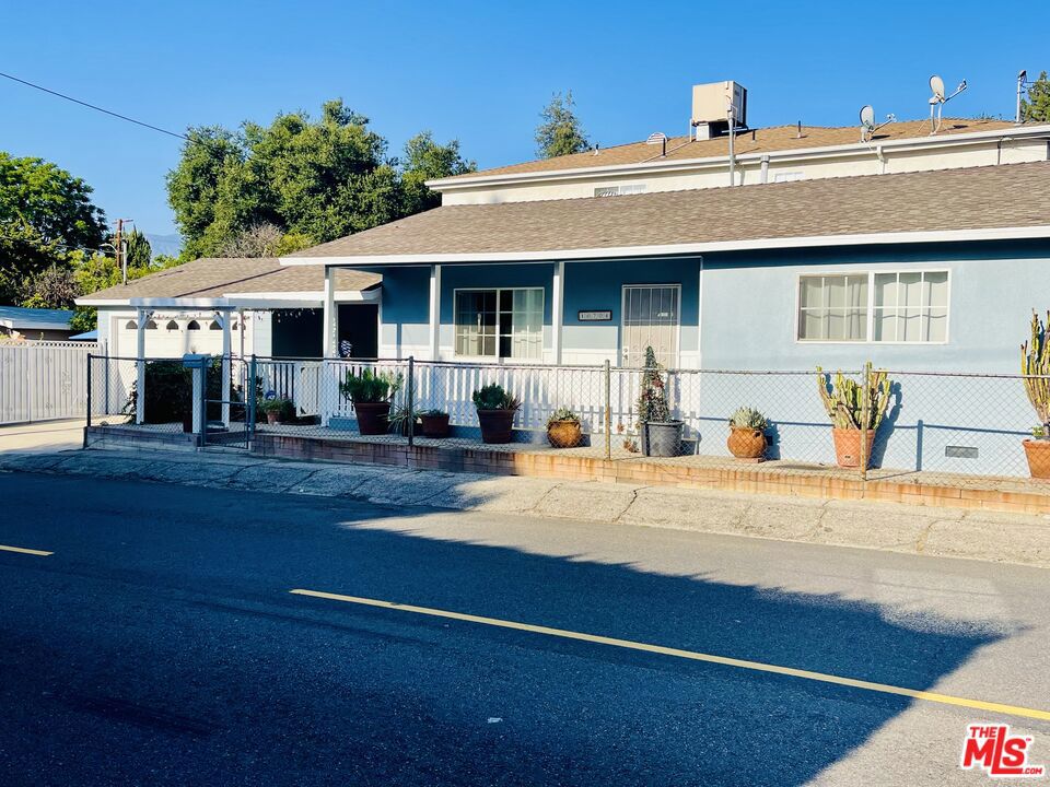 This beautiful home sits on a corner lot. Boasting 2 bedrooms and 1 bathroom, this home features granite countertops in an updated kitchen. Recessed lighting, new windows and hardwood flooring are some of the many amenities this home features. There is plenty of natural light and lots of space for the square footage. The lot seems much bigger, as it has a nice yard with plenty of fruit trees and a covered patio which is optimal for entertaining guests. AC unit is perfect for those hot summer days. There is a two car detached garage, so parking is not an issue. It is close to the river, canyon, golf course, mountains, equestrian stables as well as freeways, transportation and shopping. Don't miss out!!