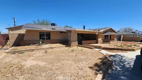 Photo of 22330 Miramot Road, Apple Valley, CA 92308 (MLS # IV26026077)
