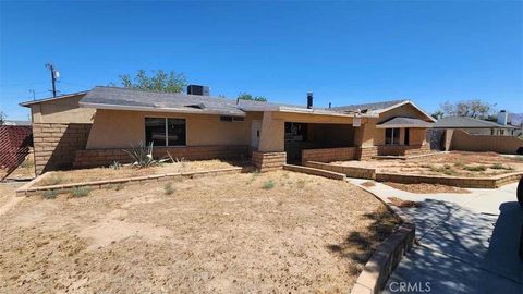 Photo of 22330 Miramot Road, Apple Valley, CA 92308 (MLS # IV26026077)