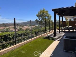 Great VIEW!!! You don't want to miss this beautiful upgraded bright and airy view home in the Citron neighborhood of Esencia in Rancho Mission Viejo! 4 Bedrooms, 3 full bath,2264 sqft with downstairs bedroom and full bathroom. Neutral Quartz countertops with custom backsplash. Luxury wood flooring throughout downstairs. This floor plan begins with an inviting entry foyer. From the foyer, an open and airy Great Room emerges and connects effortlessly with a dining room and kitchen. The cook’s kitchen showcases elegant cabinetry, pantry, stainless steel appliances and large center island ideal for meal preparation. A private master bedroom suite with spa-inspired bath offers a separate shower and soaking tub, dual vanities and an ample walk-in closet for storage and display. Discover all that this community has to offer with its outdoor adventure and amenities right outside your door. Residents are able to enjoy a wide array of clubhouses, multiple parks including a dog park, 8 pools, 3 state-of-the-art gyms, sports fields, community farms, miles of scenic hiking trails, Montessori School, the newly completed Boulder Pond, Camp Out facility, tennis and pickleball courts and more! This home is also just a short 10 MINUTES WALKING DISTANCE to highly rated Esencia K-8 School. Don’t miss your chance to live in one of the most desirable neighborhoods in Rancho Mission Viejo! Additionally, it is just 15 minutes from the beach and conveniently located near the 241 freeway, providing a short 20-minute drive to Irvine and surrounding cities.