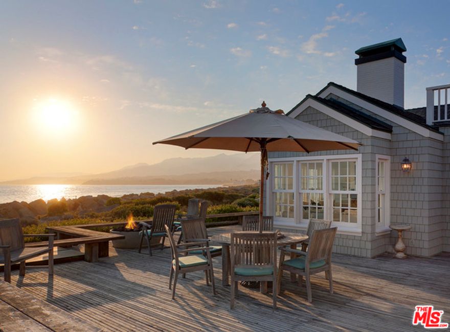This magnificent Cape Cod-style oceanfront estate features a wondrous home and comfortable, private guest house on nearly 1.5 acres in the prestigious gated Sand Point beach colony near Montecito, CA. Facing approx +/- 120 ft. of beach frontage, the main residence offers 3 bedrooms and 3 full baths plus 2 half-baths. The charming guest house provides a bedroom, bathroom, living room and kitchen. An elevator in the main residence serves a lower level. The expansive wraparound deck and on-deck spa overlook the ocean and pristine beach, while a refreshing lap pool offers views of the revered Carpinteria Salt Marsh Reserve, and beyond to the mountains. Overall, this spectacular estate is a masterpiece of design & craftsmanship. The list of amenities, tasteful accouterments, and convenient recreational, social and cultural options goes on and on. Suffice it to say that this magnificent Cape Cod-style oceanfront estate is nothing short of magical.