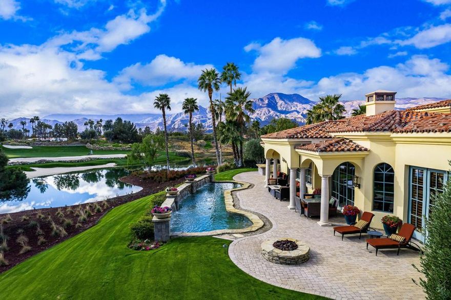 Incredible custom home located behind the private gates of The Hideaway!  This 6388 square foot home sits on a cul-de-sac and offers great space for family & friends!  Courtyard entry takes you to one of two pools on the property with direct access to the guesthouse with sitting room, kitchenette, walk in closet, bedroom, and bath.   These is also a courtyard staircase that leads to the second casita with large bedroom and private bath and balcony!  Step into the iron and glass double doors that lead to the formal entry and living area with fireplace, travertine flooring, with a backdrop of large windows.  Large culinary kitchen with warm wood cabinetry, granite slab counters, 2 islands both with sinks, stainless appliances. The dining area and family room is just off the kitchen with fireplace, wet bar and walk in wine vault to make for great entertaining!  Large primary suite with hardwood flooring, sitting area with fireplace, stunning custom walk in closet, beautifully appointed primary bath with soaking tub, walk in shower, & double vanities.  There is a private office with warm finishing including wood flooring, custom wood built-ins, and shutters.  There is additional space in the main house that is being used as a media room.  The second pool is located in the back with paver patio, flowing water features, built in BBQ island, fire pit, and plenty of room for dining or lounging in the sun!  Take in the stunning panoramic views of the fairway, lake, and mountains this home has to offer!  There is a long paver driveway leading to the 2 car garage with an additional golf cart garage!*NOTE: Home is set up as a 3 bedroom, office, and media room/study but can be a 5 bedroom home as each room has its own bathroom, closet,& doors that open up to the outside.