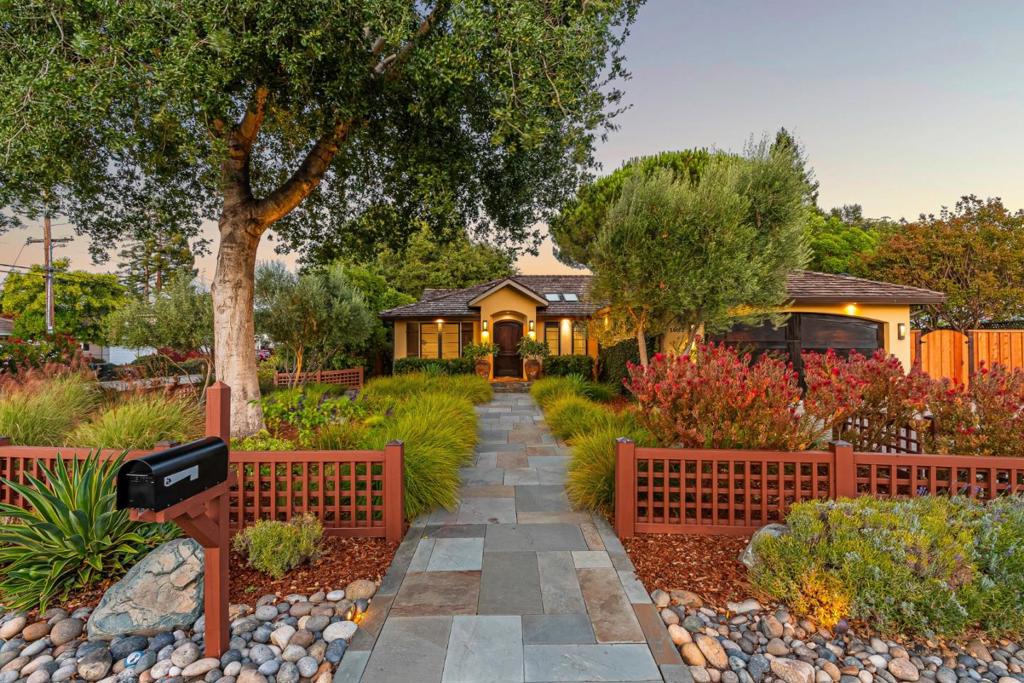 California Dreamscape: Designer Luxury Meets Outdoor Bliss. Rebuilt from the frame out in 2009 and refreshed over the last 3 years, this stunning home is a masterclass in California indoor-outdoor living. The Sunset Magazine-inspired landscaping sets the tone. Step into a welcoming foyer and expansive Great Room with cathedral ceilings, exposed beams, and wide-plank white oak floors. The gourmet chefs kitchen features a sitting island, dolomite marble counters, refreshed cabinetry, professional grade stainless appliance including Wolf range, Thermador appliances, Sub-Zero wine cooler, skylights, and walk-in pantry. Premium LaCantina folding doors on two walls create seamless flow to the entertainers backyard: PebbleTec pool/spa with solar heating, firepit lounge, built-in BBQ, expansive Ipe decking, Connecticut bluestone patio, and lush lawn. The primary suite offers a spa-style bath with heated floors, Porcelanosa vanities, oversized shower, and custom walk-in closet. Three additional bedrooms include custom wardrobe closets. A detached artist studio/workshop just over 100 sq. ft., Tesla solar, EV charger, and copper gutters and downspouts complete this exceptional lifestyle home. No expense spared.
