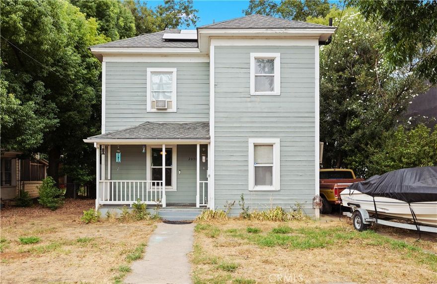 Welcome to this 3-bedroom, 2-bathroom, Edwardian Era home in downtown Oroville. This residence combines classic charm and modern convenience, making it an excellent choice for timeless, everyday living. The first floor features a formal living room, dining room, a full bathroom and a kitchen. Just beyond the kitchen, you'll find an enclosed porch with washer and dryer hooks ups, as well as extra storage space. Upstairs offers a primary bedroom, a second full bathroom in close proximity, and two additional rooms which could be used as bedrooms, an office or flex space. Step outside to a spacious, fully fenced backyard with plenty of shade-ideal for letting pets roam or having the perfect spot to entertain family and guests. Enjoy the benefits of leased solar already in place. All of this is located within walking distance to shops, restaurants, schools, banks, and the many amenities downtown Oroville has to offer!