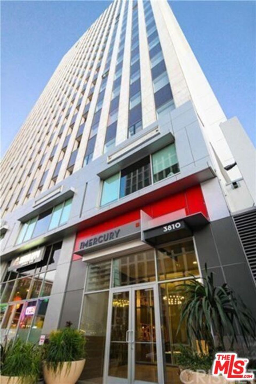 Luxury High Rise Condominium in Mid - Wilshire District.  Two-bedroom, two-bathroom condo with stunning north-facing views. This unit features elegant Bamboo and new carpet  floors, sleek Granite countertops in the kitchen, complete with an in-unit Washer & Dryer for your convenience. Two side-by-side parking spaces are included. Enjoy the building's 24-hour security and a Zen-styled lobby with terrazzo floors. Stay active in the state-of-the-art fitness center, unwind at the resort-style pool and spa, or entertain guests at the fire pit and barbecue area. The 23rd-floor rooftop recreational center offers panoramic 360-degree views and an event lawn, perfect for gatherings. Located in the vibrant heart of Koreatown, you're minutes away from a variety of dining options, shopping, theaters, and popular plazas such as Ralphs and Korean Market. Don't miss this opportunity to lease a slice of luxury in a thriving community!