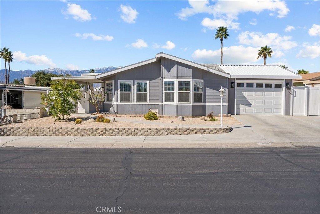 Nestled in the heart of Palm Desert, where the warm desert sun kisses the horizon, this exquisite home is a sanctuary of comfort and elegance. This spacious home has three bedrooms, plus a bonus room that could be used as a fourth bedroom, and two beautifully remodeled bathrooms, this home offers a harmonious blend of modern sophistication and classic charm. Boasting over 2,000 square feet of thoughtfully designed living space, every inch of this home has been carefully updated to reflect contemporary taste. The extensive remodel includes high-end kitchen finishes, creating an inviting atmosphere that's both chic and relaxing. Whether you're entertaining guests or enjoying a quiet evening, the open floor plan provides the perfect backdrop for any occasion. Step outside to the covered backyard that acts as an oasis. This home has a one car garage, a feature that enhances both convenience and security, while offering additional space for storage or leisure. The home’s position across from a pristine golf course allows you to enjoy serene views and the relaxing sounds of nature, all just a stone's throw away. Energy-efficient with fully paid-off solar panels and a newer roof, and no Land Lease! This home provides peace of mind for years to come, while minimizing energy costs. Situated in a coveted 55+ community, this residence is designed for a relaxed lifestyle, offering both tranquility and a strong sense of community. It’s not just a home—it’s a lifestyle waiting to be embraced. Don’t miss the opportunity to make this gem yours!
NOTE-Assessor reads this as a two bedroom, there is an additional possible bedroom and bonus room for a possible three bedroom plus office.