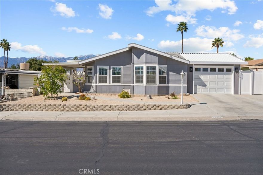 Nestled in the heart of Palm Desert, where the warm desert sun kisses the horizon, this exquisite home is a sanctuary of comfort and elegance. This spacious home has three bedrooms, plus a bonus room that could be used as a fourth bedroom, and two beautifully remodeled bathrooms, this home offers a harmonious blend of modern sophistication and classic charm. Boasting over 2,000 square feet of thoughtfully designed living space, every inch of this home has been carefully updated to reflect contemporary taste. The extensive remodel includes high-end kitchen finishes, creating an inviting atmosphere that's both chic and relaxing. Whether you're entertaining guests or enjoying a quiet evening, the open floor plan provides the perfect backdrop for any occasion. Step outside to the covered backyard that acts as an oasis. This home has a one car garage, a feature that enhances both convenience and security, while offering additional space for storage or leisure. The home’s position across from a pristine golf course allows you to enjoy serene views and the relaxing sounds of nature, all just a stone's throw away. Energy-efficient with fully paid-off solar panels and a newer roof, and no Land Lease! This home provides peace of mind for years to come, while minimizing energy costs. Situated in a coveted 55+ community, this residence is designed for a relaxed lifestyle, offering both tranquility and a strong sense of community. It’s not just a home—it’s a lifestyle waiting to be embraced. Don’t miss the opportunity to make this gem yours!

NOTE-Assessor reads this as a two bedroom, there is an additional possible bedroom and bonus room for a possible three bedroom plus office.