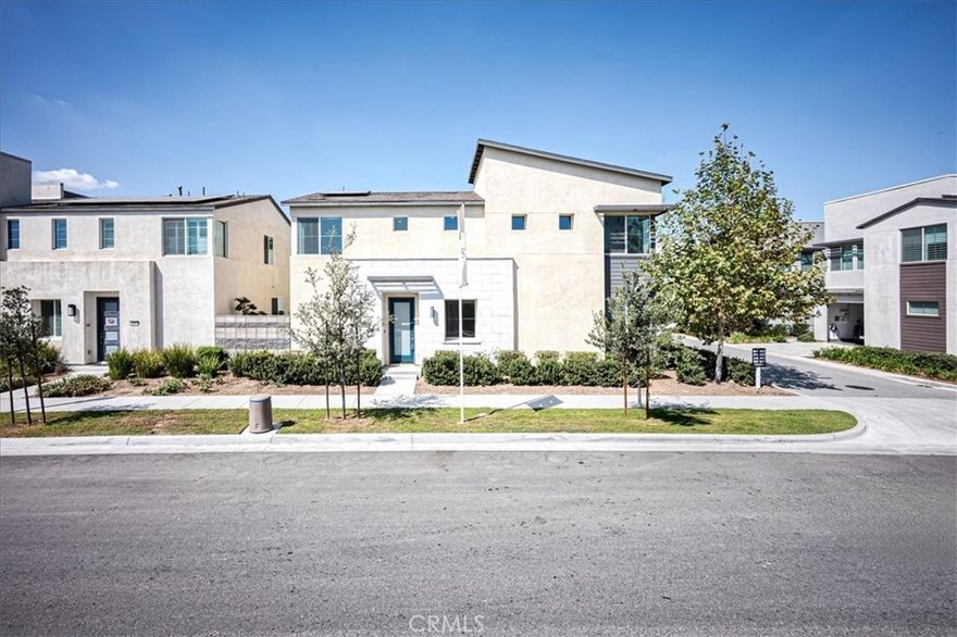 Wonderful community in Ontario Ranch area.  Newer development with community offerings and resort-style amenities including a refreshing resort style swimming pool, spa, children’s playground, and dog park. This development blends community living in an upscale neighborhood with modern design and decor. Home feels brand new with stainless appliances in kitchen, beautiful sleek countertops, tile and carpet.  Block wall for security and privacy and attached 2 car garage on an end unit. Centrally located just minutes to freeways like the 60 & 15, upscale grocery stores, and a fun food court.  And Paid For Solar...you can't ask for more.  Move in ready, must see to appreciate.