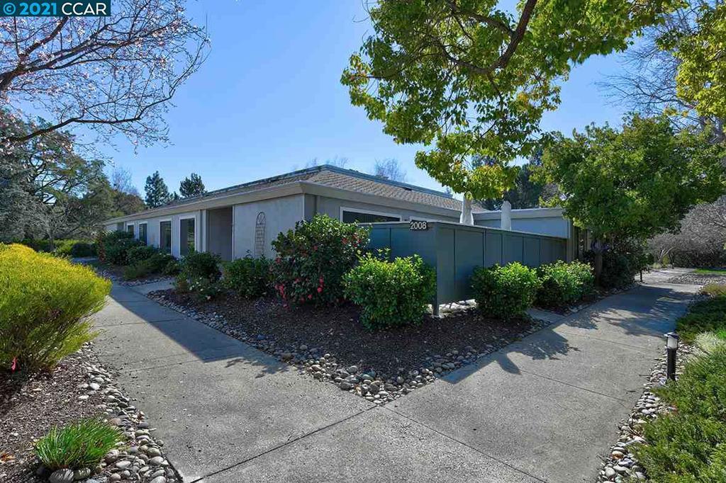 Lovely and charming Yosemite model. Level-in -No steps. Updated kitchen stainless steel appliances, Upgraded refrigerator, granite counters, custom cabinetry, range and microwave. Skylight in Kitchen. Both bathrooms nicely updated and have stall showers. Master bath has a skylight., Dual pane windows throughout. Enclosed spacious patio that offers good privacy. This end unit has light and bright interior. You will like the location. Easy access to the Gateway center and one of the nicest parks in Rossmoor! There is an additional separate laundry building nearby. Be sure to show this terrific home to your clients who would like level walk in access.