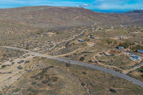 Photo of 5190 Pioneertown Road, Pioneertown, CA 92268 (MLS # JT26004638)