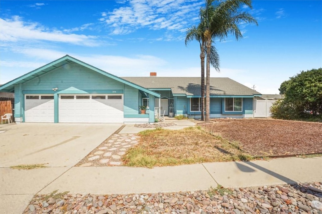 4 Bedroom/2bath, 1 story pool home with RV parking in Corona. This is a rare find with over 2000 square feet of living space on one level on a corner lot. Kitchen features an island, lots of cabinet storage and open to the dining/family room. Enjoy high ceilings, two living room areas, a large indoor laundry room with additional storage and an attached 3 car garage to fit multiple cars, toys, etc. The oversized primary suite includes two closets, sliding door to the backyard and a renovated bathroom with a walk-in shower. There are 3 additional guest bedrooms and a second upgraded bathroom. Step outside to the backyard where you'll find a large sparkling pool with a diving board. Plenty of room to entertain, the backyard also features a large concrete patio. Bring the RV/Boat/Toys to store on the spacious side yard with an RV access gate. Recent upgrades include a new pool filter, all new windows, new vinyl fencing, new garage door opener and exterior paint. All of this with low taxes, no HOA in a wonderful established neighborhood in Corona. Conveniently located near top rated schools, parks, shopping, restaurants and easy 91/15 freeway access.