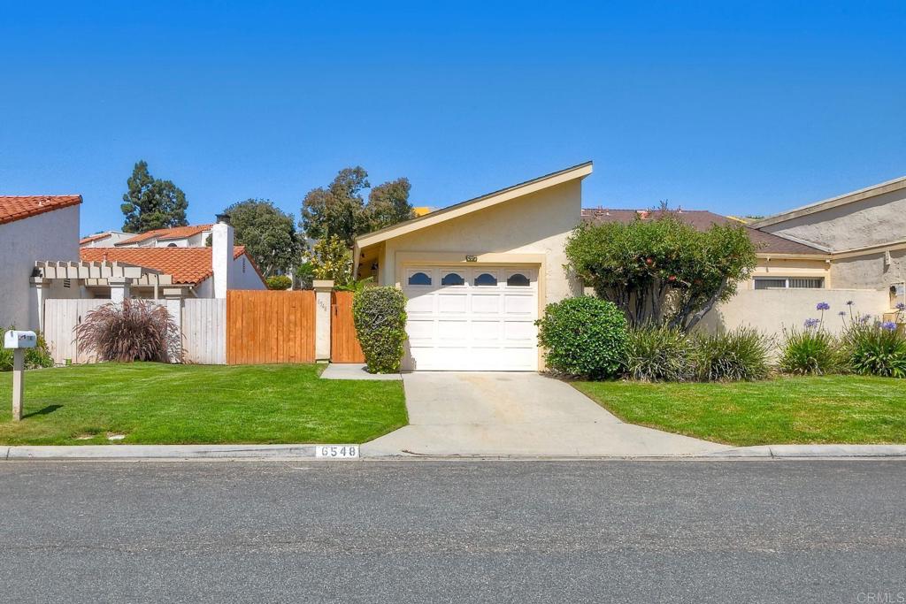 Move in ready South Carlsbad single story home. The property features two bedrooms with Jack and Jill bathrooms finished with travertine tile. The large primary suite has a walk-in closet with a private patio. The second bedroom is currently being used as a dining room with sliding door access to the back patio. The living room has a gas fireplace. The eat in kitchen is ideal for your favorite meals with easy access through the sliding door to the large welcoming outdoor patio. The home has central heating and washer and dryer in the oversized one car garage with room for a second car on the parking pad. The spacious private landscaped front and back yard offers room to relax while enjoying the wonderful southern California weather. It will ensure you feel right at home whether you spend your time inside or out. This is a quiet and private location with easy access to the freeway. Light and bright interior with a green space right behind the property with access to community facilities of pool, spa and clubhouse. Enjoy the coastal breezes and walk or bike to the beach or parks. The property is a short drive to shopping, dining and one mile to the beach.
