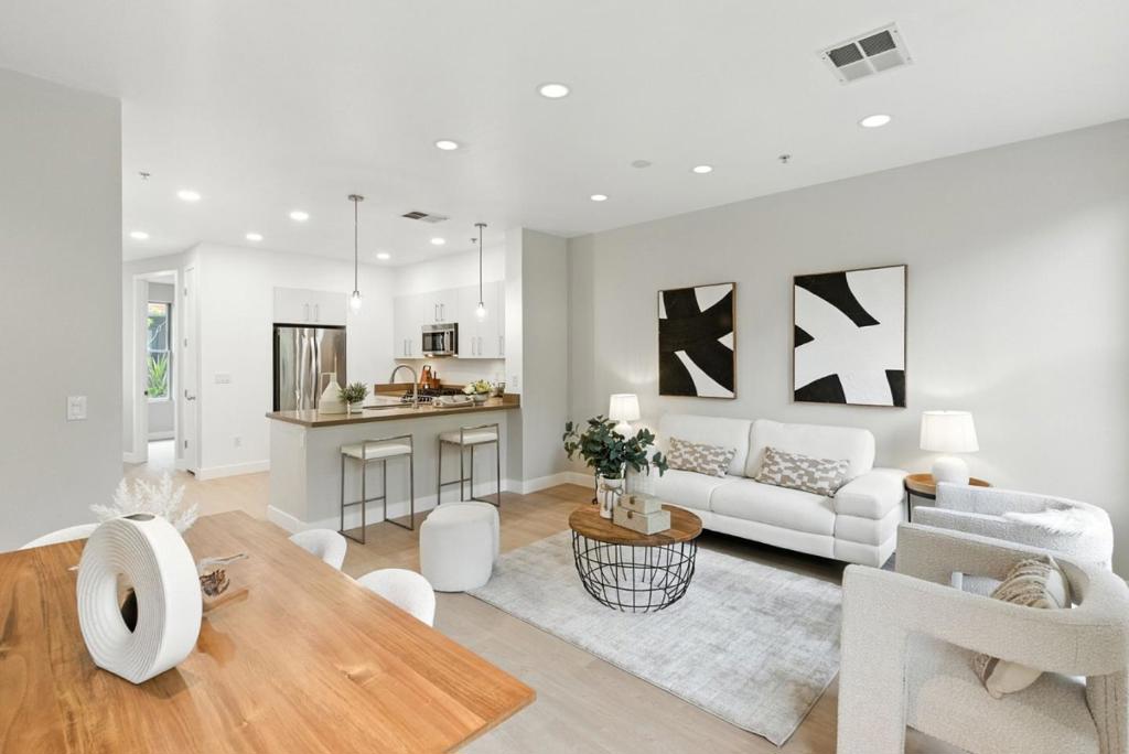 Stunning home in the best courtyard-facing location in Altaire Walk, a meticulously crafted townhome community in the heart of Silicon Valley. First time on market in 15 years! Enjoy a bright, freshly updated interior with new flooring, paint, and lighting, creating a move-in-ready experience. Unbeatable for families, this home offers a safe, kids-friendly community where children can play with minimal supervision, fostering independence and community connections, plus extreme proximity to the JCC with a potential membership discount for the gym, pool, and soccer fields. Close to CalTrain, shopping, farmers markets, and restaurants. Highly sought Palo Alto School district, Buyers to verify. Easy commute to San Francisco, Silicon Valley. Don't miss this rare opportunity!