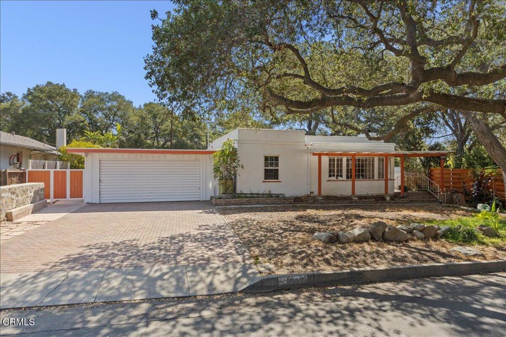 Spanish Revival Charm in the Heart of The OaksWelcome to 1009 Laurel Road, a truly one-of-a-kind residence nestled in Santa Paula's highly sought after Oaks neighborhood, known for its picturesque, oak-lined streets and homes rich with character. This Spanish Revival gem beautifully blends classic architecture with timeless appeal. Step inside to discover warm wood floors, arched doorways, and natural light that flows effortlessly throughout. The home offers two generously sized bedrooms, a spacious living room, and a versatile great room--ideal for a home office, game room, or entertainment space to suit your lifestyle. Sitting on a 10,125 square foot lot, the property offers incredible outdoor potential. Whether you're dreaming of a lush garden, pool, or expanded living space, the canvas is yours to create. With its unique design, prime location, and flexible layout, this home is a rare opportunity to own a piece of Santa Paula history. Don't miss your chance to live in one of the city's most beloved neighborhoods.