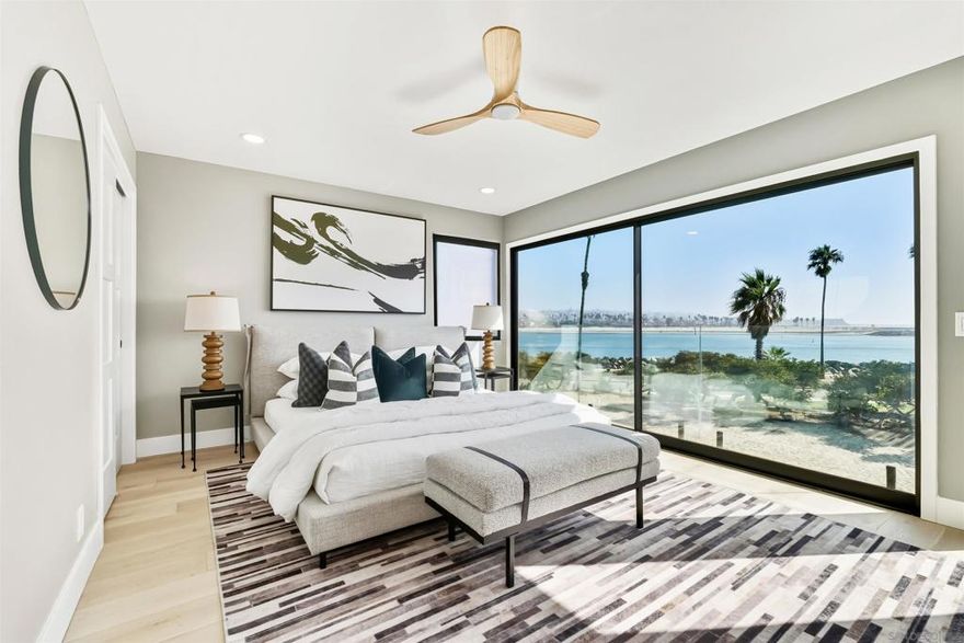 (Value range $4,999,000- $5,699,000)  The most private location on Ocean Front Walk! Entertainer’s Dream with Expansive Views! This fully remodeled 5-bedroom coastal retreat is the ultimate San Diego beach house. Designed for entertaining, the outdoor spaces feature multiple decks, a spacious patio with Bromic heaters, Sonos speakers, firepit with seating for 10+, a built-in BBQ, and a wellness area complete with hot tub, cold plunge, and sauna. Natural light pours through Fleetwood doors and Marvin windows, framing breathtaking views of Mission Beach, whitewater in Ocean Beach, boats cruising out to sea, and the cliffs of Sunset Cliffs illuminated at night. The main level boasts open-concept living with a custom kitchen featuring quartzite countertops, wood shaker cabinetry, Dacor appliances, wet bar, and seamless indoor-outdoor flow to the deck. Upstairs, the private primary retreat offers dual closets, a spa-like bath with marble finishes, and panoramic ocean vistas. Two additional bedrooms share their own bath with marble countertops and enjoy access to an east-facing deck for sunrise views. Downstairs, a secondary living/game room with wet bar provides additional entertaining space, along with two more bedrooms and a full bathroom. Newly laid pavers surround the property, creating a clean and modern coastal vibe. Parking for 3 cars included. This home is a rare opportunity to own a luxury entertainer’s paradise in one of San Diego’s most iconic beach communities.