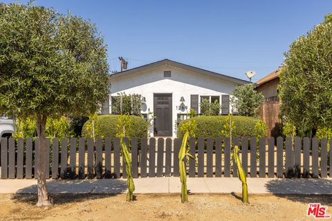Photo of 1/2 S Muirfield Road, Los Angeles, CA 90019 (MLS # 26831749)