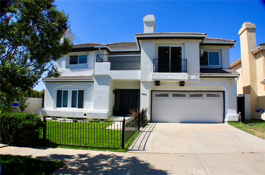 NESTLE IN SOUGHT IN TARZANA! THIS 2,900 SQ FT TWO STORY HAS 4 BEDROOMS AND 3 BATHS WITH VAULTED CEILINGS AND AN INVITING OPEN FLOOR PLAN. THE SPACIOUS FLOOR PLAN FEATURES A LARGE ENTRY, LARGE LIVING ROOM AND DINING AREA WITH FIRE PLACE, FORMAL FAMILY ROOM WITH WET BAR AND FIREPLACE, CHARMING BREAKFAST AREA WITH FRENCH DOORS THAT LEAD OUT TO A LOVELY BACK YARD. NEWLY REMODELED GOURMET KITCHEN WITH CENTER ISLAND, NEWLY UPGRADED STAINLESS STEEL APPLIANCES, GRANITE COUNTER TOPS, WINE FRIDGE AND CUSTOM CABINETRY. THE OVER SIZED MASTER SUITE HAS TALL CEILINGS, FIREPLACE, PRIVATE PATIO, SITTING AREA, WALK-IN AND WARDROBE CLOSETS. THE 3 OTHER GENEROUSLY SIZED BEDROOMS FEATURE LARGE CLOSETS, 2 OF WHICH ARE WALK-INS. THIS HOME INCLUDES AN AMPLE LAUNDRY ROOM UPSTAIRS, MIRRORED CLOSETS, CENTRAL VACUUM SYSTEM, ALARM SYSTEM, 2 CAR ATTACHED GARAGE, PRIVATE GRASSY REAR YARD SHADED BY MATURE TREES AND LANDSCAPING. THIS HOME HAS BEEN BEAUTIFULLY MAINTAINED WITH NEWER PAINT AND HARD WOOD FLOOR DUAL PANEL WINDOWS.