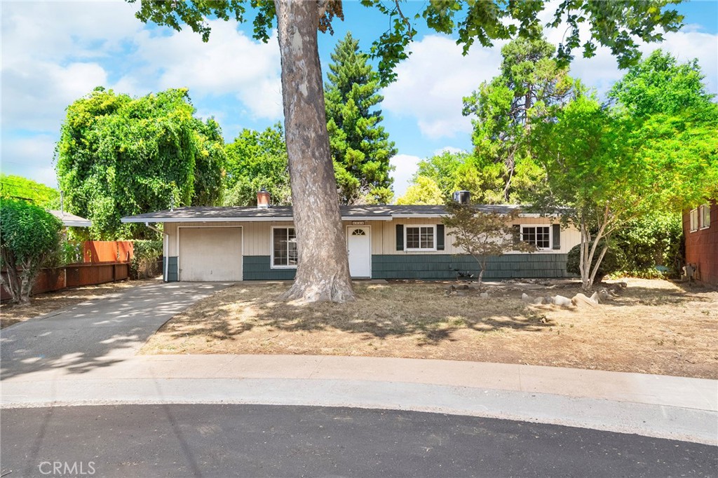 Tucked at the end of a quiet cul-de-sac in central Chico, 2344 Porter Way is ready for its next chapter. Whether you're a first-time homebuyer or an investor looking to grow your portfolio, this 3-bedroom, 1-bathroom home offers charm, potential, and a location that makes everyday living easy, just blocks from the Esplanade, freeway access, local eateries, and schools. Step inside and you'll find a comfortable living room with vaulted ceilings, natural light, and a cozy wood stove insert. It connects effortlessly to the dining area and the kitchen, creating an open layout that makes hosting family or friends a breeze. Down the hallway, all three bedrooms are well-sized and thoughtfully positioned near the full bathroom. Each one features vaulted ceilings and generous natural light, making the spaces feel bright, airy, and inviting. Outside, the large backyard is full of possibilities. The attached 1-car garage offers built-in shelving and laundry hookups, providing great storage and functionality to support everyday life. Outside, the spacious backyard is full of potential. Mature trees offer ample shade, a large concrete patio invites outdoor dining and weekend barbecues, and there's plenty of room for gardening, play, or your future backyard dreams. A handy shed offers extra space for tools and gear. With central HVAC and a layout that makes sense for real life, this home is packed with opportunity in one of Chico's most convenient neighborhoods. Come discover what's possible at 2344 Porter Way.