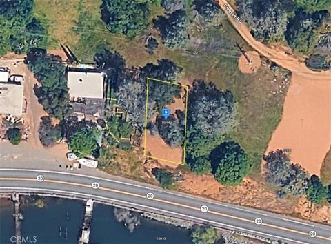 Photo of 10896 E Highway 20, Clearlake Oaks, CA 95423 (MLS # AR26062667)