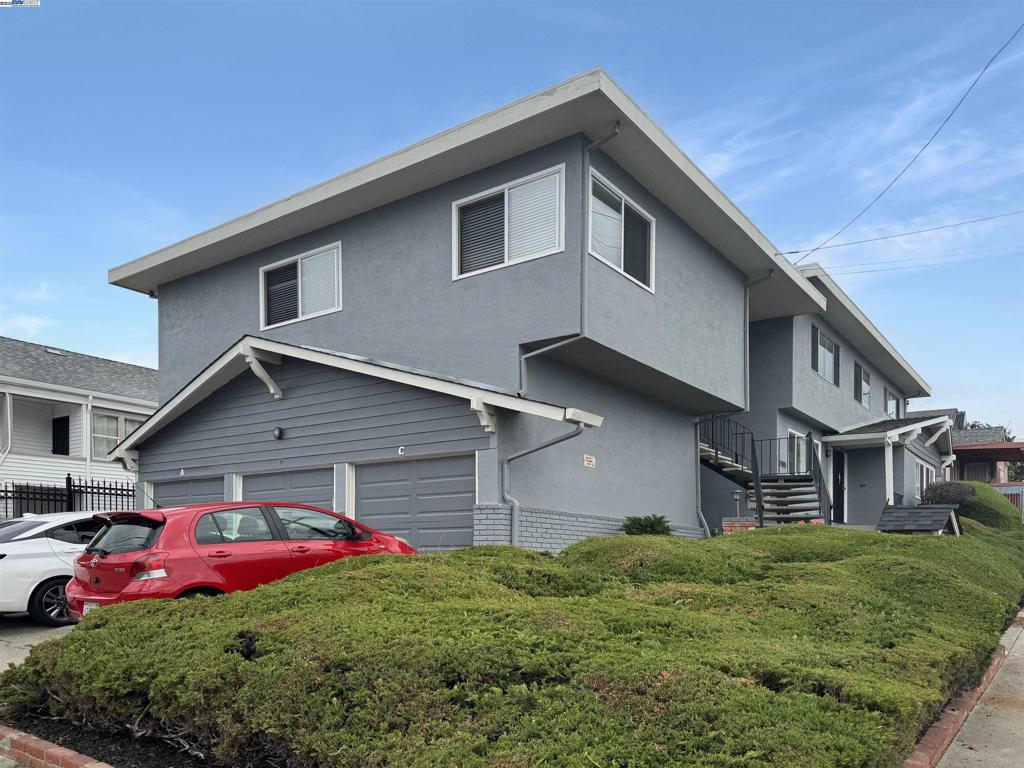 Beautifully renovated triplex in Oakland’s vibrant Fruitvale neighborhood, offering a turnkey investment or ideal multi-generational living opportunity. The property features a spacious three-bedroom, two-bathroom unit with a private backyard and two comfortable two-bedroom, one-bathroom units. Each unit enjoys a garage plus tandem parking (2:1 ratio), on-site laundry, dual-pane windows, and renovated interiors with upgraded floors, newer kitchens, and refreshed baths. Recent exterior paint enhances curb appeal. With a Walk Score of 86, residents can easily reach neighborhood shops, cafés, restaurants, markets, and nearby parks, including Courtland Creek and Maxwell Park. Commuters benefit from quick access to multiple bus lines, Fruitvale BART, and freeways I-880 and I-580. Strong rental potential and room for rent growth make this an exceptional, highly walkable, and commuter-friendly investment in the heart of Fruitvale.