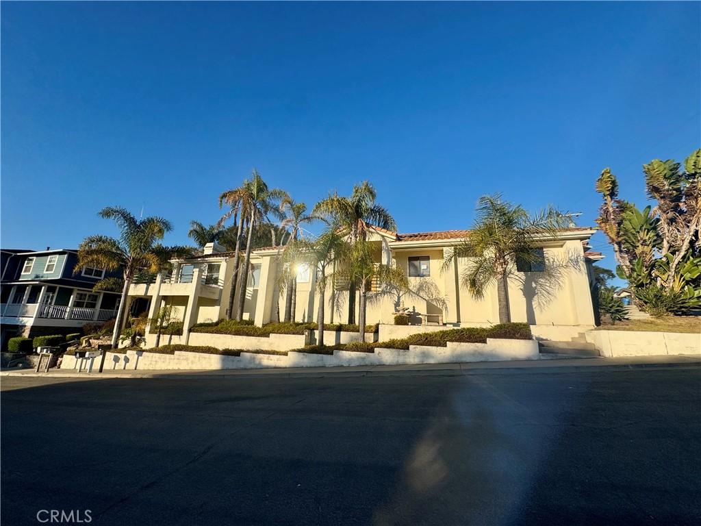 This Stunning 3-Bedroom, 2.5-Bath Contemporary Mediterranean Home Offers a Unique Blend of Style, Space, and Coastal Charm. With Clean Architectural Lines, a Classic Clay Tile Roof, and Easy Maintenance Landscaping, This Property Is a True Canvas Ready for Your Personal Vision. Inside, You'll Find a Bright and Airy Floor Plan With Generously Sized Living Spaces, and Large Windows That Fill the Home With Natural Light. Whether You're Looking to Renovate, Redesign, or Simply Refresh, This Home Has Incredible Potential to Become a Show-Stopping Coastal Sanctuary. Located Just a Short Drive From the Beach, Shopping, and Dining, You'll Enjoy the Best of Both Comfort and Convenience. Don't Miss This Opportunity to Own a Spacious, Stylish Home in a Prime Location With Endless Possibilities!
