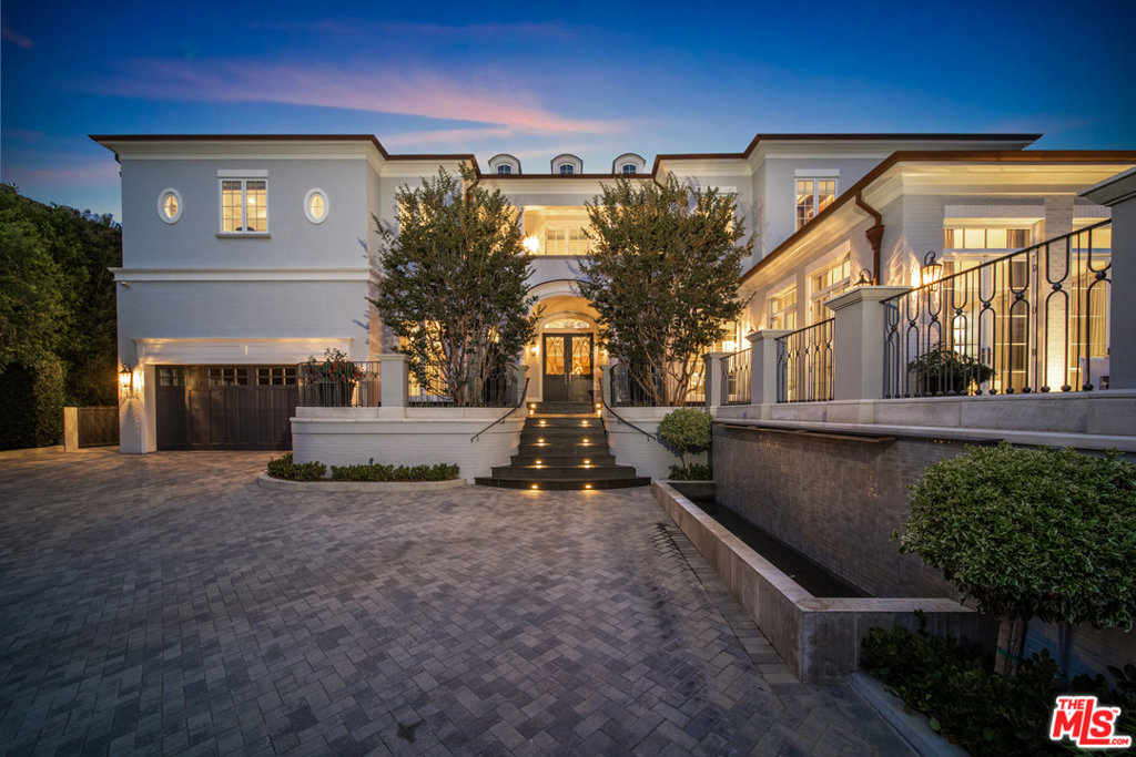 Absolutely stunning estate located south of Sunset in Prime Brentwood Park. This 13,000 square foot property is prominently situated atop a natural bluff with views to the ocean. Boasting a total of 7 Bedrooms, 12 baths, huge master bedroom with his her baths and closets, movie theater, wine room with dining area, gym with steam room and sauna, large flat yard, putting green and outdoor covered cabana, this home built in 2017 leaves nothing to the imagination. With Privacy and additional security features, this Brentwood Park Traditional offers all of the amenities you could ask for while being walking distance to the Brentwood Country Mart.