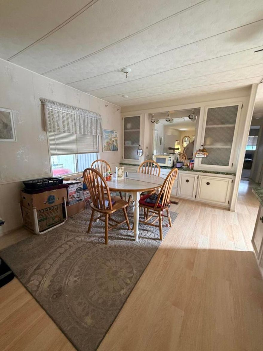 Welcome home to this charming 2 bedroom, 2 bathroom manufactured home located in the desirable Rancho Mirage Mobile Home Park . Situated on a prime corner lot , this home enjoys extra privacy, open views, and no nearby obstructions - giving you a light, bright, and airy feel throughout.Inside, you'll find a comfortable floor plan with a spacious living area, dining space, and an efficient kitchen ready for your personal touch. The home could use a bit of updating, making it a perfect opportunity to add your own style and value . Both bedrooms are well-sized, and the two bathrooms offer convenience for guests or shared living.Step outside to enjoy the generous outdoor space that a corner lot provides - ideal for gardening, entertaining, or simply relaxing and taking in the peaceful surroundings of this beautiful community.Rancho Mirage Mobile Home Park is known for its well-kept grounds and inviting neighborhood feel. Whether you're looking for a full-time residence or a seasonal retreat, this home offers an affordable chance to get into a great park and customize a space to your liking.