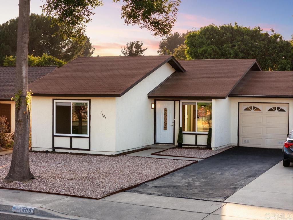 Welcome to ranch style 55+ living! This move-in ready twin-home is light and bright and offers living room views of sunrises & mountains. Featuring an all new kitchen with quiet close cabinetry, big stainless sink, stainless steel appliance package, granite countertops & tile backsplash, all new custom bathroom, new mirrored closet doors, vinyl-clad windows with custom window covers, updated lighting, lux vinyl flooring, ceiling fans, and all fresh paint inside. Two bedrooms, plus office/den off kitchen. Lot is extra deep with room for garden, to build an ADU, expand the main house, and even to build your own spa or pool (see virtually staged photos).