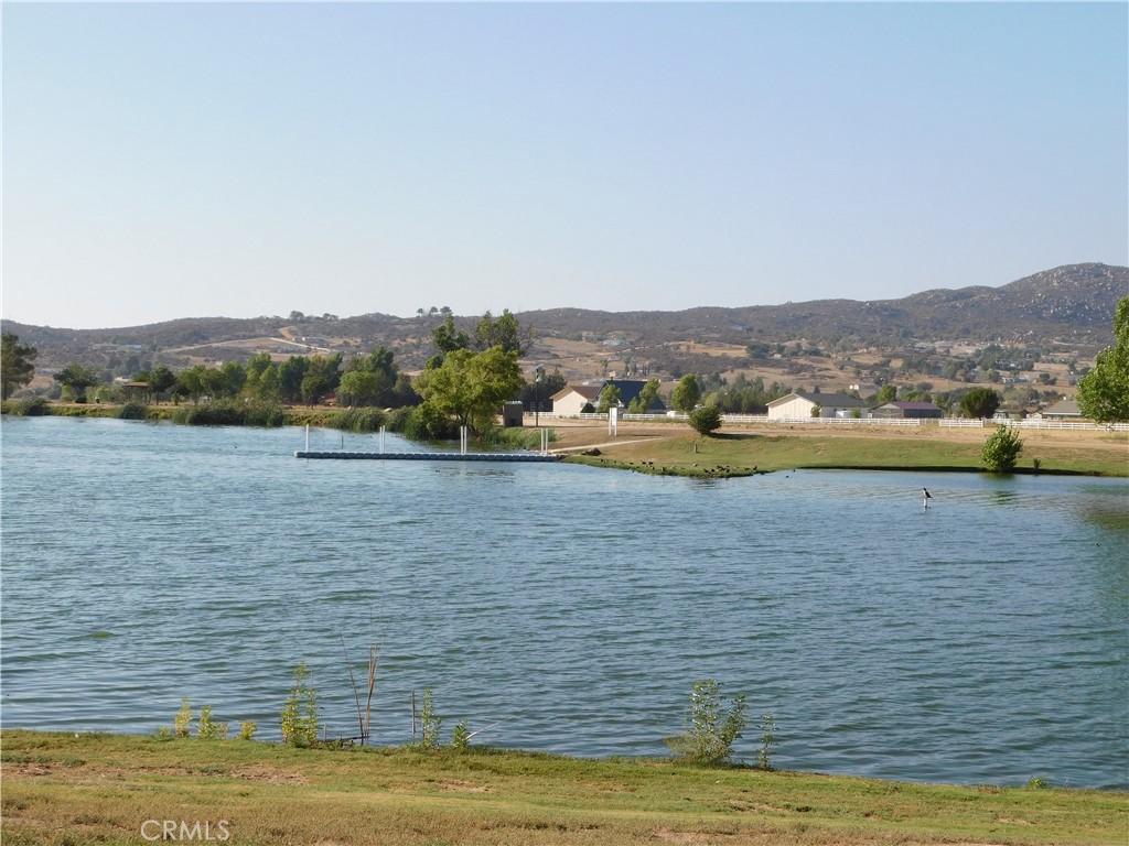 Beautiful usable 3.61-acre parcel located in Lake Riverside Estates "Gated Community". Including Boundaries Survey, Fenced Front, back and west side of property. Build your custom home to face the Lake and beautiful Mountains, Enjoy the community amenities including Private 3600' airstrip, (The airstrip includes a VASI system, guest tie down parking and AWAS Advanced Weather Awareness System). equestrian trails and arena, 55-acre lake with picnic areas, and fishing, community pool, sports courts, Cal Fire Dept located inside community, Security, and so much more. This community is enjoyed by those who can appreciate and respect natural rural living. At approx. 3500' elevation the temperatures are usually "about" 10 degrees cooler than Temecula. There are several attractive destinations within an hour including Idyllwild, Julian, Palm Desert and Temecula Wine Country. Plan on building your dream home here. Don't miss this great opportunity of owning one of the Biggest Lots in Lake Riverside Estates.