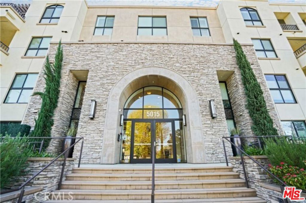Amazing opportunity to own in Encino, on the lower level in The Balboa Villas, recently built in 2019. This immaculate newer home offers 1,371 square feet of living. Large open floor plan with a spacious living room with glass sliding doors with plantation shutters which lead to the amazing private balcony. Your family chef will love the gourmet kitchen with mosaic glass backsplash, quartz countertops, deep barn style sink, lots of self-closing cabinetry/storage, endless countertop space, island & GE stainless steel appliances. 2 bedrooms, 2 full bathrooms + bonus room which can be anything you want ie. dining area/office/guest room. Master bedroom has its private bathroom with double sink, quartz countertop, extra-large walk-in closet, frameless shower & separate soak in tub. 2nd large bedroom & 2nd bathroom which offer a tub shower with beautiful large tile backsplash. In unit stackable washer & dryer closet. Plantation shutters throughout. 2 car tandem parking spaces. Each unit has individual water meter & gas is included in the monthly dues. Community amenities include concierge, Earthquake insurance, fitness center, library, community room, fire place, and outdoor seating areas with barbecues & lots of guest parking. For an additional fee you can obtain an electric car charger, storage cages & wine lockers. Home is located near restaurants, shopping centers, parks & freeway.