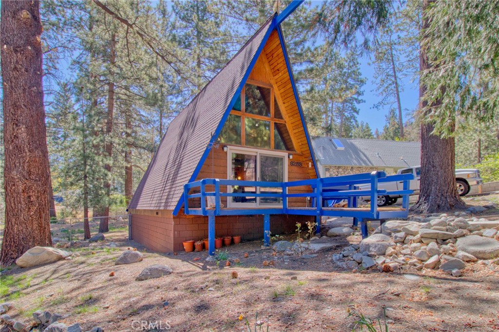 Welcome to your cozy mountain getaway! Nestled in the heart of Wrightwood, this charming A-frame cabin offers the perfect blend of rustic charm and modern comfort. Just minutes from Mountain High Ski Resort and a short stroll to downtown shops and restaurants, this is the ideal retreat for outdoor enthusiasts or those seeking a peaceful escape.
This inviting home features 1 spacious bedroom and 1 full bathroom, plus a versatile loft area that can serve as a second bedroom, home office, or creative studio. The warm and welcoming living room is anchored by a classic wood-burning fireplace—perfect for snowy evenings and relaxing weekends. The house is to be left furnished.
Step outside to a fully fenced backyard with a storage shed, offering both privacy and space for your outdoor gear, pets, or garden dreams.
Whether you're looking for a full-time residence, vacation home, or rental opportunity, this Wrightwood gem is a must-see!
Highlights:
Prime location near skiing, hiking, and town center
1 bedroom + loft / 1 full bathroom
Cozy wood-burning fireplace
Fully fenced backyard with shed
Classic A-frame architecture with mountain vibes
Don't miss your chance to own a slice of mountain paradise!