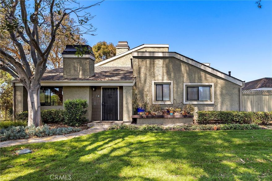 Welcome to 1 Starfish Court, a stunning and rare single-story end-unit in the coveted Newport Terrace community, ideally positioned for privacy and surrounded by mature birch trees that create a very special and tranquil natural setting. This unique and rare gem is a thoughtfully upgraded 2-bedroom, 2-bathroom featuring new bamboo flooring throughout, vaulted ceiling channeling privacy and natural light with interior laundry. The open living area includes a stacked stone fireplace and flows into a fully remodeled kitchen with GE Café appliances, fine wood cabinetry and stone countertops. Dual sliding glass doors lead to a private patio, perfect for relaxing, entertaining as well providing direct access to your 1 car garage and carport. The primary suite offers high ceilings, additional direct patio access, including generous closet space, while the second bedroom will offer up flexibility for guests or a home office.



Bordered by the Talbert Nature Preserve and Canyon Park, Newport Terrace surrounds itself with miles of trails, bike paths, with direct access to the Santa Ana River Trail leading to the beach. Community amenities include two pools, a spa, sport court, and lush green spaces surrounded by mature trees, a coastal setting that feels private yet connected. Welcome to 1 Starfish Court delivering an exceptional blend of location, privacy, and tranquility!