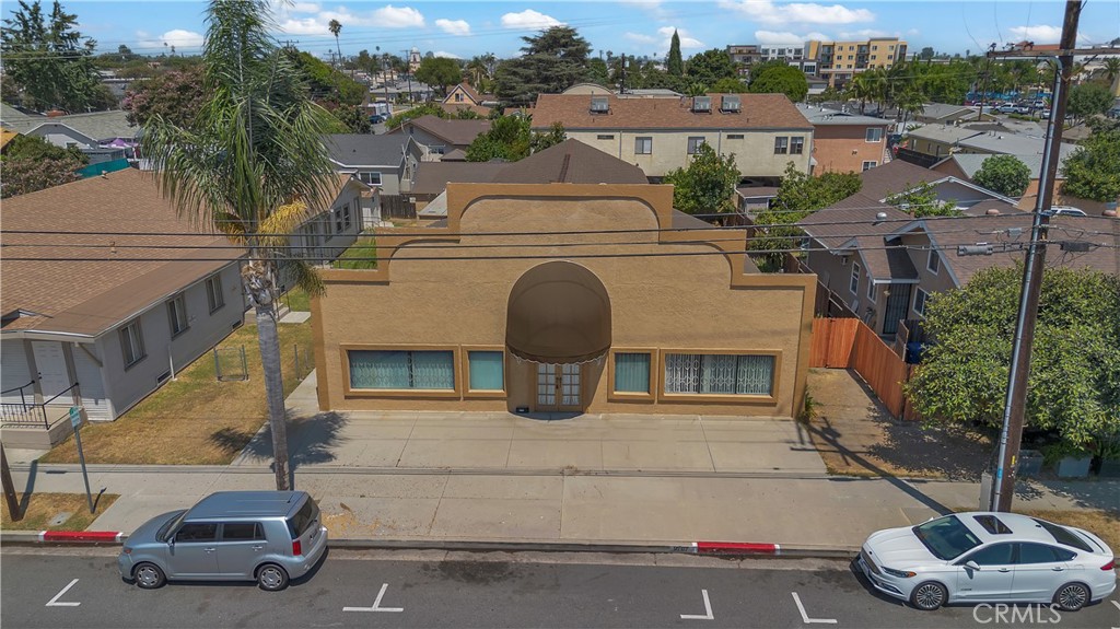 Where opportunity meets location! Located in the heart of Bellflower, this SUPER SPACIOUS 4050 square foot Commercial Building offers so many possibilities for your growing business needs! This stand alone building is zoned CG and is located in a highly visible location with excellent street frontage, and close to all major freeway (91, 605 & 105), great eateries and retail. Consider the possibilities for expanding your current business, office space, medical building, House of Worship, dance studio or entertaining venue. The building has 2 restrooms, a kitchen for preparing foods or a break room for employees, and 2 expansive open areas with very tall ceilings, with the ability to expand to a loft, along with small offices/rooms. There is also a garden area on the side of the property, along with 2 storage sheds available for use.
Limited parking is available on the street OR there is a nearby parking lot available for sale by the same seller if buyer requires numerous parking spaces. The lot is located at 9721 Flower St. and is 5746 square feet with approximately 15 parking spaces for your needs. *This information is in a separate listing under Land and this would be a separate transaction.
Property is sold in it's current condition with no expressed warranties. Buyer to check with City of Bellflower regarding all buiding uses and property restrictions, requirements, etc. Buyer to verify all square footage and permits.