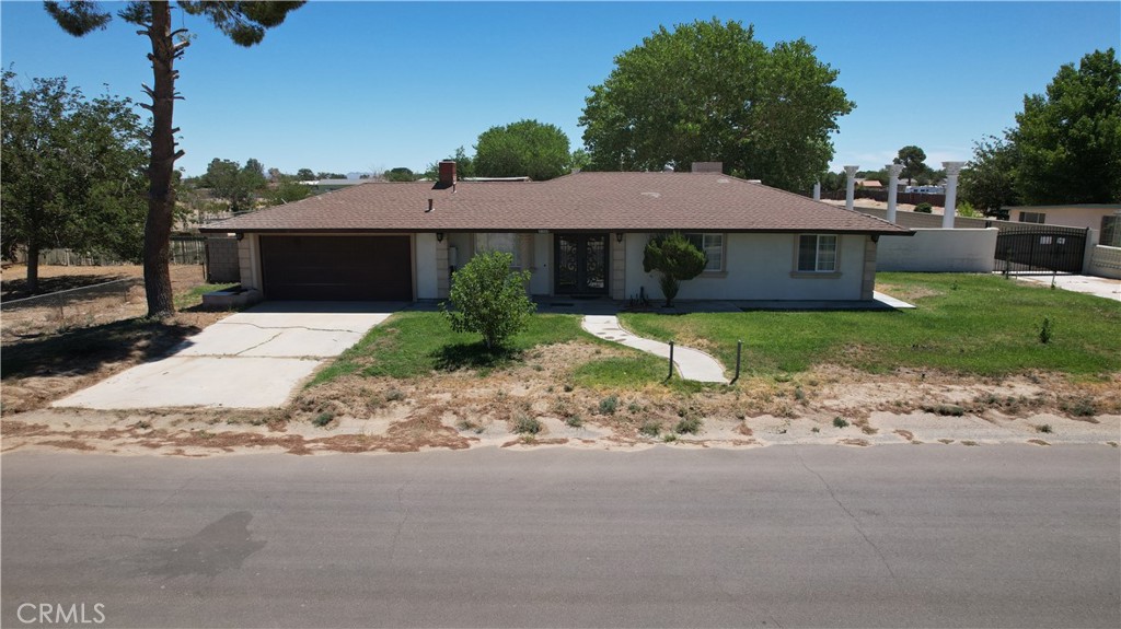 Beautiful Ranch Home with Modern Touches on 1.12± Acres - Lake Los Angeles Welcome to 41060 158th Street East, a beautifully updated ranch-style home offering comfort, functionality, and abundant outdoor space. This charming property features 3 spacious bedrooms, 2 remodeled bathrooms, and 1,134± sq ft of living space—all situated on a generous 1.12± acre lot, perfect for family living, animals, and future expansion. Step inside to discover a custom-upgraded kitchen with sleek granite countertops, modern cabinetry, and open sightlines—ideal for both everyday living and entertaining. The bathrooms have been tastefully updated, and the entire home showcases tile flooring throughout, smooth-finish walls and ceilings, custom paint, and recessed lighting that adds a clean, modern feel to every room. Outside, the expansive backyard offers endless potential with ample space for gatherings, a large detached storage room, and two detached studio units—(No permits) each approximately 400± sq ft. These studios are perfect for extended family, rental income, a home office, or personal retreats. This is a rare opportunity to own a versatile, move-in-ready home in a peaceful rural setting—zoned for horses and animal use and with plenty of room to grow.