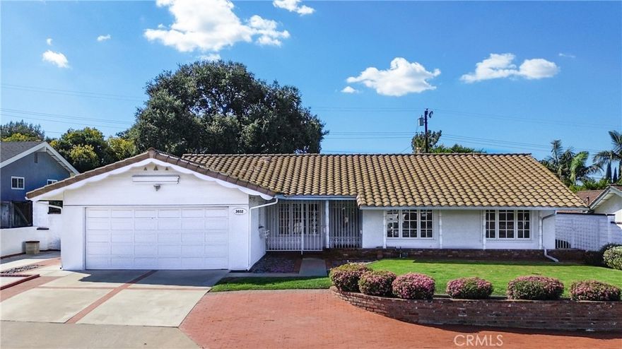 This classic 3 bedroom, 2 bathroom home is located in the heart of the City of Orange. As you enter this 1456 sqft home, you are greeted by a cozy living room featuring a brick fireplace (with modern insert) and plenty of space for entertaining. Adjacent to the living room you will find a large dining area and eat-in kitchen with peninsula seating. As you travel down the hall you will find 2 large bedrooms, the hallway bathroom and the primary-suite, which features an en-suite bathroom. Many original, classic features can still be found throughout the home. As you enter the private backyard oasis, you are greeted by a large Oak tree that offers beauty and shade to the expansive yard. The yard also features multiple patios, an expansive grass area, a fully fenced dog run in the rear and endless possibilities. The home sits within very close proximity (short walk) to Eisenhower park, Olive Elementary School, shopping/dining options, the Santa-Ana river trail, and has excellent access to local freeways. This classic gem presents a wide range of options, opportunities and amenities that are difficult to find anywhere else in Orange County.