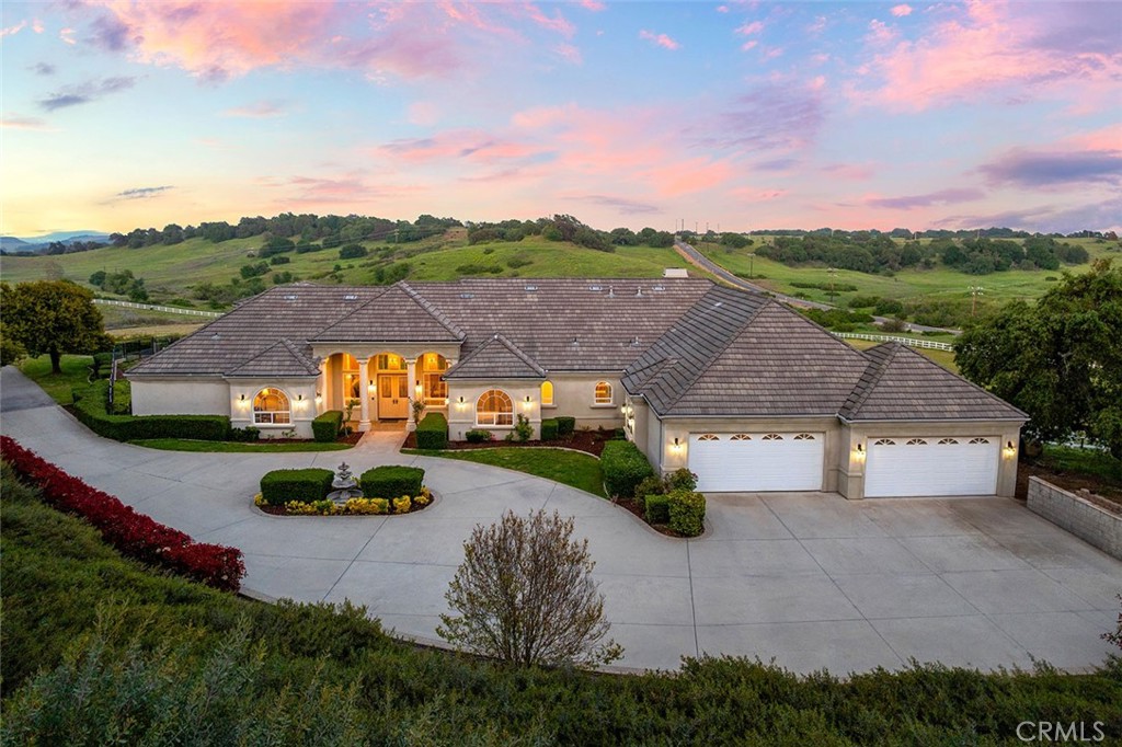 ONCE-IN-A-LIFETIME OPPORTUNITY! VERY PRIVATE 15.7-ACRE ESTATE SURROUNDED BY NATURE CONSERVANCY IN TENAJA ON THE SANTA ROSA PLATEAU! The grounds consist of 2 fully fenced & cross-fenced parcels with water at the end of a gated cul de sac with an abundance of usable land for horses/livestock, a large pad where a 16-stall breezeway barn had been planned, direct trail access, plenty of room for the largest of arenas, your own majestic ancient oak forest around the house, stunning views of the Santa Rosa Plateau Ecological Reserve, and a feeling that you are in the middle of a natural wonderland, while being only 10 minutes’ drive to the conveniences of town. This is a very rare combination of acres of usable land and a pristine, newly refurbished mostly single-story 4867 sf luxury estate with all bedrooms downstairs, 5-car garage, paid-for 44-panel ground-mount solar system, high-efficiency heat pumps, solar-thermal heated pool, an “Eagles Nest” 2nd-story office with balcony and iconic views. The entire home has been meticulously renovated with the latest on-trend, high-quality appointments, including custom engineered hardwood floors, 2ft x 4ft flooring tiles, quartz counters, all-new cabinetry, appliances, HVAC, front door, designer plumbing fixtures, electric blinds, high ceilings, 8-ft interior doors, and open to the kitchen, a grand great room with media alcove & forever views. This view property is RARE, offering flexibility to build future structures, complete privacy, and is extremely convenient to freeway & amenities. It is surrounded by nature, has both mature trees & gigantic usable pastures, is updated & turnkey, and sits in a lovely part of Tenaja with a security gate at the entrance to the private cul de sac. Ask about the ability to build a 2nd Primary Home, ADUs, and/or barns, and install a private water well. With two parcels (including APN 931380007), the options are plentiful! Make an appointment today to experience this masterpiece! ***LA CRESTA & THE SANTA ROSA PLATEAU: 5-ac minimum parcels (10-ac min. in SR West), minutes to schools, restaurants, hospitals, shopping, 15 Fwy & Temecula Wine Country. Enjoy this peaceful ranch community w/no commercial businesses, robust social activities, miles of private community trails & 1000s of acres of Ecological Reserve…All less than 1.5 hours from LA, SD, OC, Palm Springs & Big Bear. Discover the country, yet convenient, lifestyle of La Cresta, Tenaja & the Communities of the Santa Rosa Plateau!
