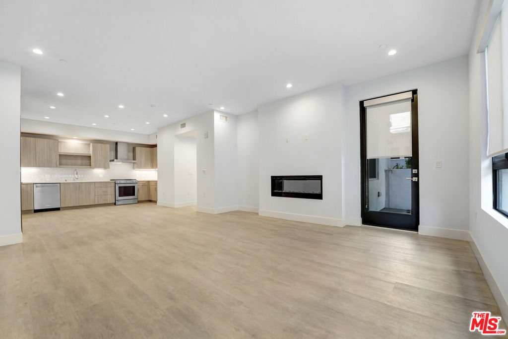 LISTED AT $4,200 /MONTH. NET EFFECTIVE RENT IS APPROXIMATELY $3,675/MONTH BASED ON 6 WEEKS FREE ON A 12-MONTH LEASE (SUBJECT TO APPROVED CREDIT). SECURITY DEPOSIT IS $4,200.) Welcome to 5955 Saturn St #104 a beautiful 2-bedroom, 2-bath unit offering comfort, convenience, and style in one of LA's most central locations. This light-filled residence features a spacious open layout, updated finishes, and modern upgrades throughout. The kitchen comes fully equipped with a stove, refrigerator, dishwasher, and stylish cabinetry, making meal prep and entertaining effortless. Enjoy the ease of in-unit laundry with a stackable washer and dryer, along with central A/C and heat for year-round comfort. Step out onto your large private balcony, perfect for morning coffee, evening wind-downs, or outdoor dining.Both bedrooms are generously sized, offering flexibility for a variety of living arrangements. The unit's clean lines and contemporary design create a warm and inviting atmosphere ideal for anyone looking to enjoy the best of LA living.Situated in a well-maintained building with secure access, this unit puts you just minutes from Beverly Hills, Century City, and an array of dining, shopping, and cultural hotspots.