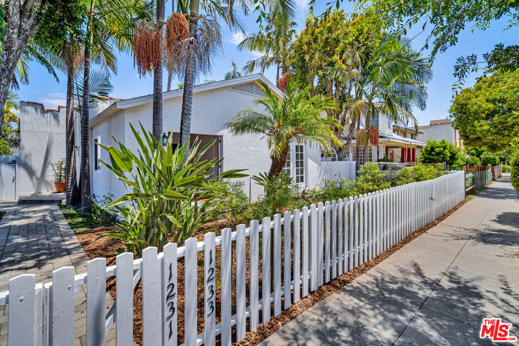 Rarely available 5 unit beach style compound with front duplex units, rear structure with 3 apartments, central garden, and 4 private garages. HIGHLY DESIRABLE SANTA MONICA POCKET steps from the beach, Montana Avenue, premium retail, and a mix of top-tier dining. Within a major medical corridor including UCLA Health and St Johns Health Center. VALUE ADD OPPORTUNITY nestled within a storybook style street scene lined with palm trees and well manicured courtyards. The property is beautifully landscaped and designed for privacy, centered around a middle garden.*Bungalow-style units with modern finishes and private access. Prime walkable location delivering Santa Monica's best in retail, transit, and coastal access. Ideal for discerning buyers seeking a low-maintenance asset with authentic character and lifestyle perks. Central laundry room + in unit washer/dryers (in front duplex). Addition of ADUs possible with conversion of garages (buyer to verify).