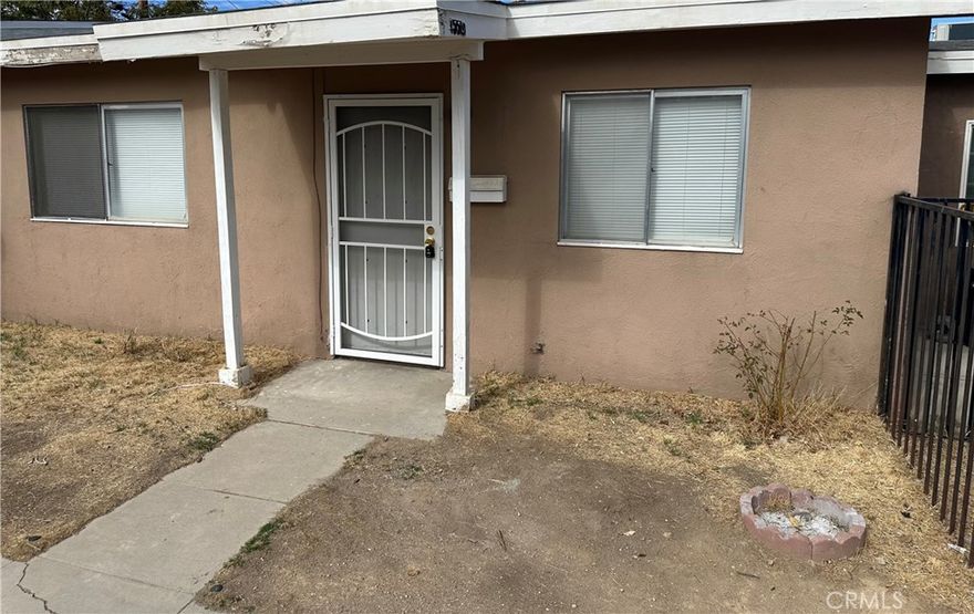 2 bedroom 1 bath unit. has small side yard New plumbing, new tile flooring and new paint.