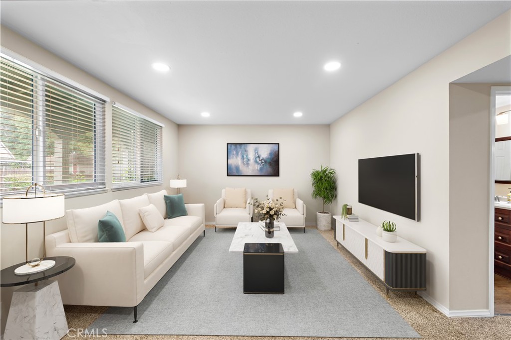 Located in the relaxing and well-maintained community of Tanglewood, this beautifully updated 3-bedroom, 2-bathroom end unit offers 1,426 square feet of thoughtfully designed living space, surrounded by lush greenbelts and resort-style amenities.
Step inside to find a renovated kitchen featuring granite countertops, modern cabinetry, and quality finishes. The home is filled with natural light and enhanced by dual pane windows and doors, recessed lighting, and recent upgrades throughout, including a new vanity in the downstairs bathroom and a newer AC unit for year-round comfort.
The spacious private patio is perfect for entertaining or relaxing and now features a new Alumawood patio cover with a skylight, recessed lighting, and a ceiling fan—creating the ideal setting for indoor-outdoor living.
Enjoy access to three sparkling pools, two clubhouses, and multiple greenbelts that provide a tranquil and connected neighborhood feel. Close to local shopping, dining and entertainment, this is the perfect place to call home.