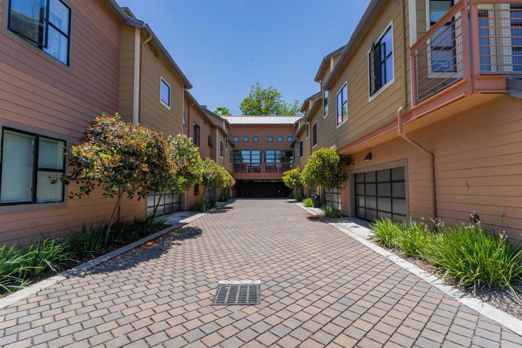 Stunning modern 2-bedroom townhome in a highly sought-after neighborhood in Palo Alto! Designed with efficiency and sophistication in mind, Unit K 4248 Rickeys Way features top-of-the-line upgrades. This home is elegant with its huge space, vaulted ceilings, hardwood flooring, and carpeting. The open floor plan of the living room is made perfect for entertainment with the installed centralized sound system. Lounging outside is also made possible with the covered patio. The true gourmet kitchen has recently-upgraded stainless steel appliances, spacious granite counters, and expanded custom cabinetry with under-cabinet lighting. Upstairs, the huge masters bedroom features an oversized sliding door closet and an attached gorgeous full bathroom with walk-in storage, jack and jill sinks, and a shower and bathtub combo. Rickeys Way is the perfect location for those who want to enjoy the best amenities such as the clubhouse, swimming pool, childrens playground, BBQ, communal garden, and the extensive greenbelt. Easy commute to Stanford University and Silicon Valley Companies: Google, Facebook, and Apple. Excellent Palo Alto schools such as Juana Briones Elementary, Fletcher Middle, and Henry Gunn High are also nearby! Pet Friendly Pet Deposit - $500